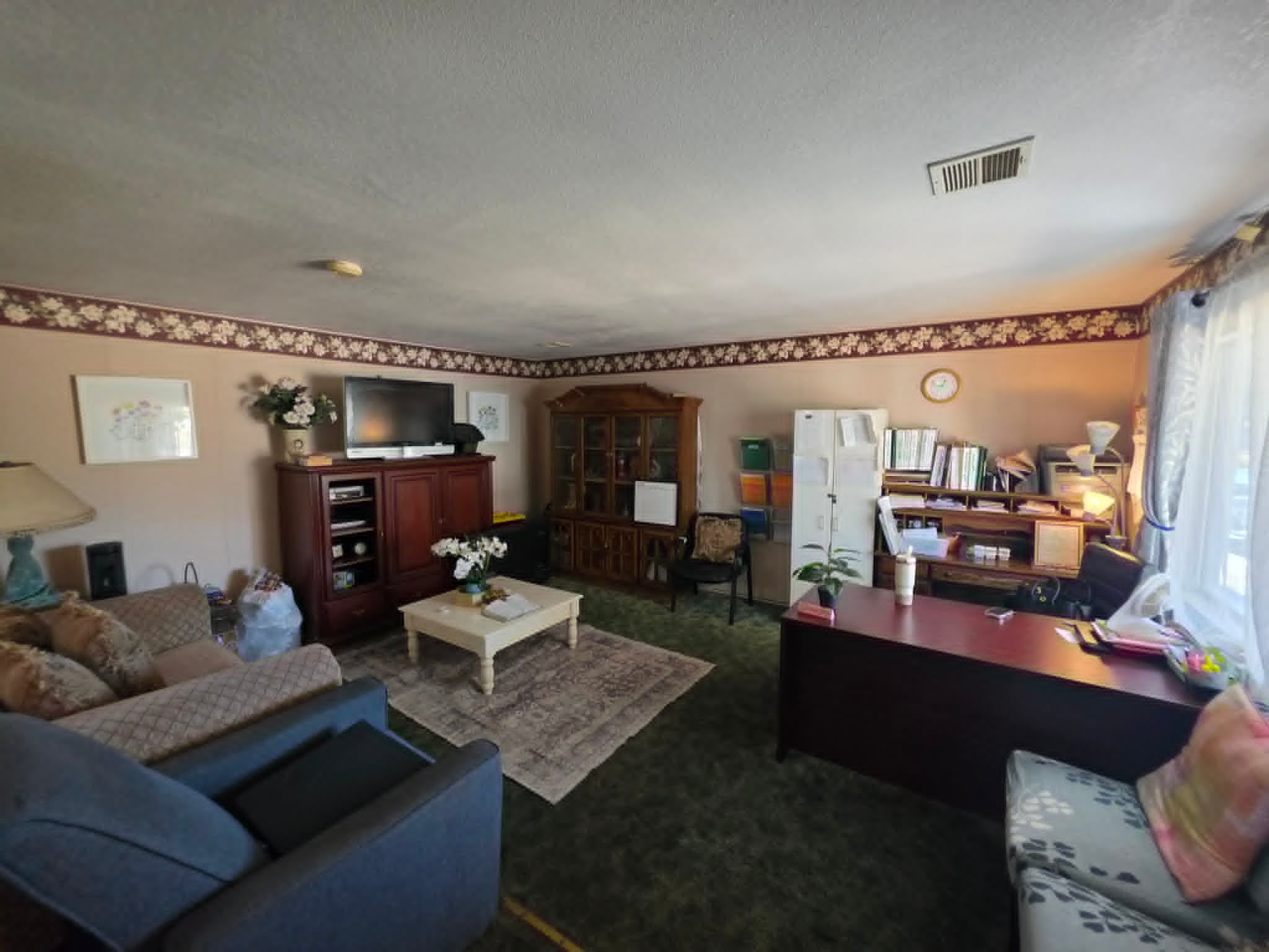 Riverside 6-Bed RCFE Property — living room