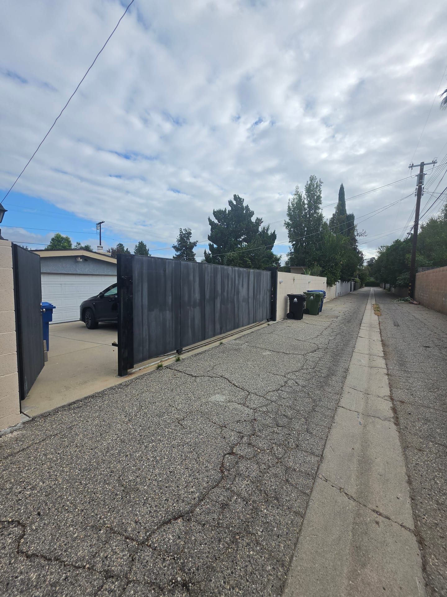 Vacant Care-Ready Property for Lease in Woodland Hills, CA — alley gate